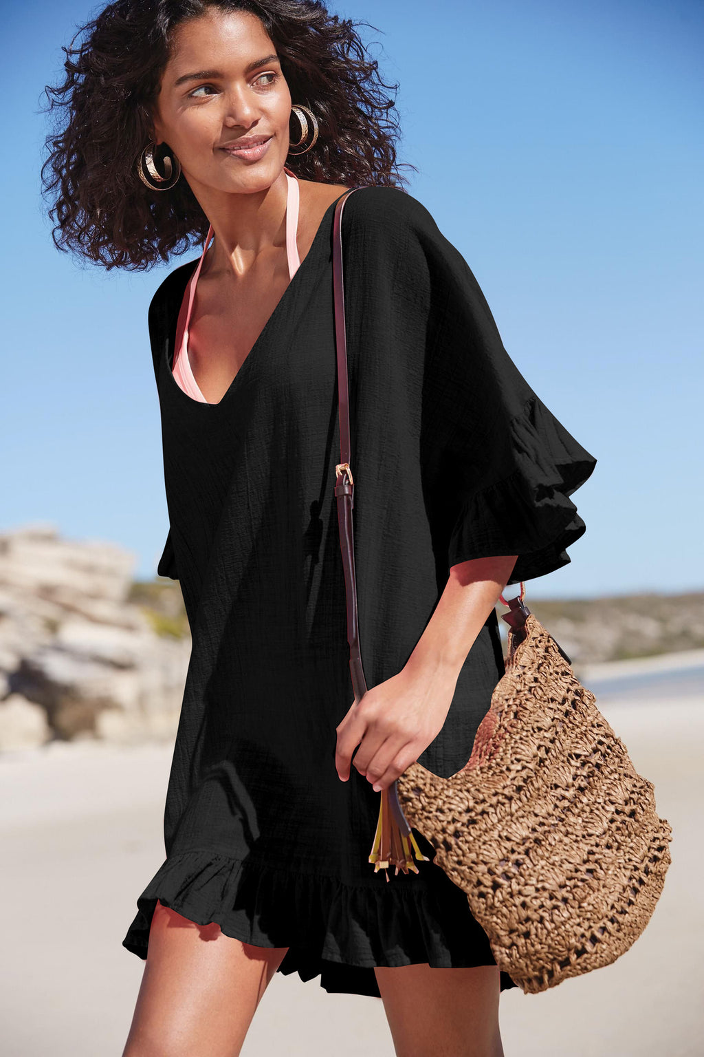 Black slub cotton one-piece swimwear with V-neck, drawstring, and ruffled hem