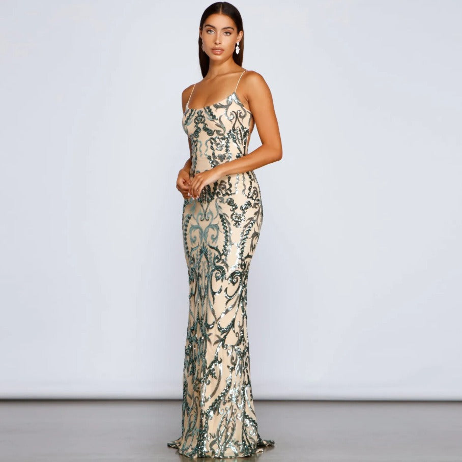 Women’s sequin maxi dress with spaghetti straps and green ornate pattern, mermaid hem