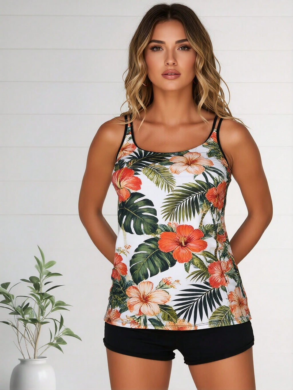 Tropical floral tankini swimwear set with hibiscus print and black swim shorts