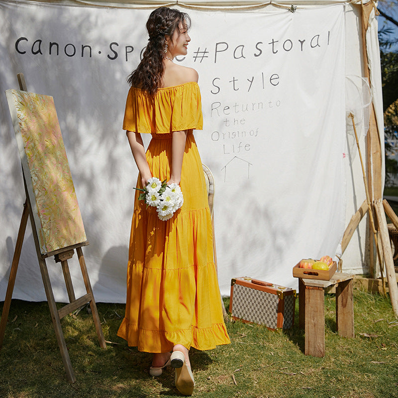 Yellow boho off-shoulder tiered midi dress with gathered waist and ruffle neckline