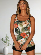 Tropical hibiscus tankini swim top with spaghetti straps and black swim shorts