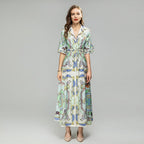 Women's sequin short-sleeve midi dress with colorful illustrated print and belted waist.