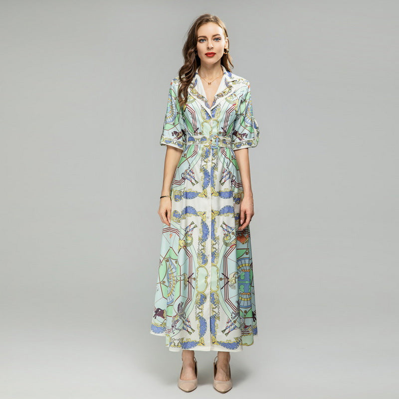 Women's sequin short-sleeve midi dress with colorful illustrated print and belted waist.
