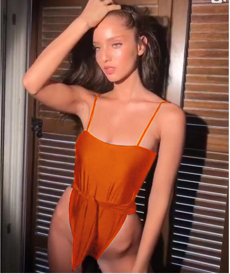 Orange one-piece swimsuit with thin straps and ruched waist front
