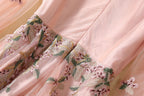 Pink sequin embroidered bodice panel with floral details and flowing A-line skirt