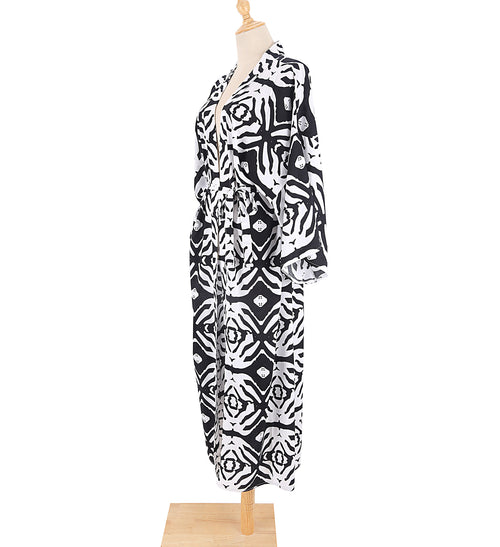 Beach bikini one-piece swimwear with black-and-white zebra print, long sleeves