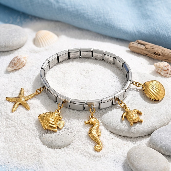 Gold-tone ocean life charm bracelet