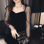 Women's black A-line dress with sheer polka-dot mesh sleeves and square neckline