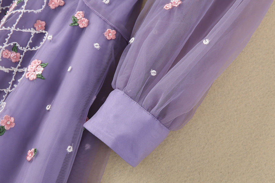 Purple sequin bodice with small floral embroidery and sheer tulle overlay