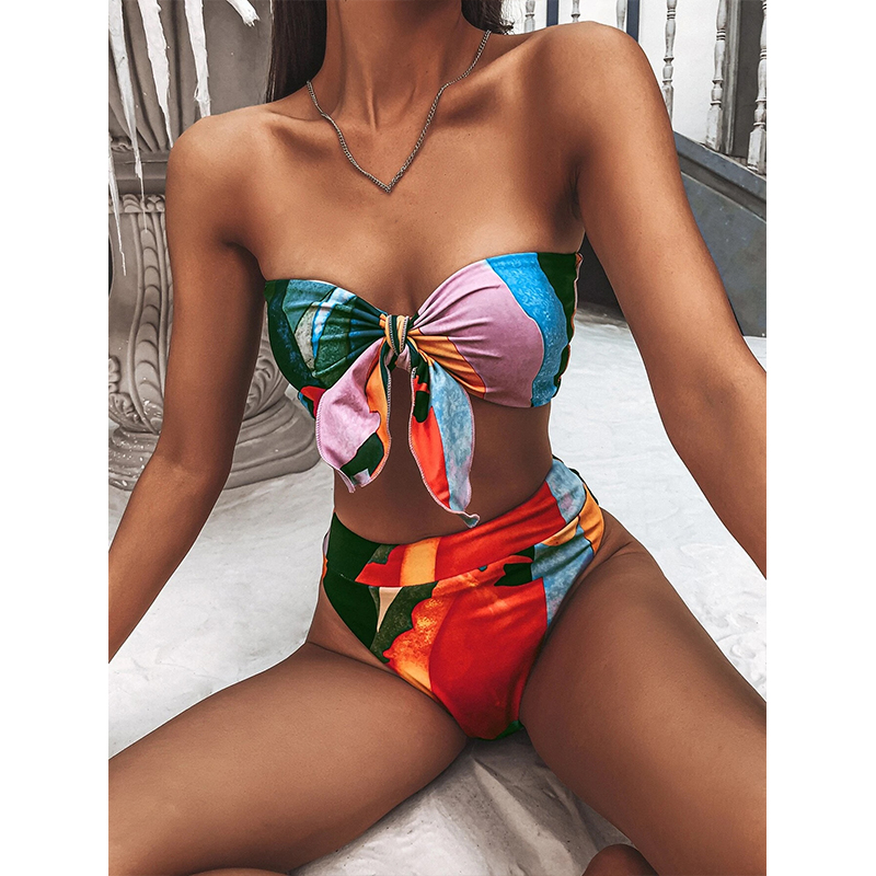 Print knot bikini set with bandeau top bow detail and high-cut bottoms, colorful abstract print.