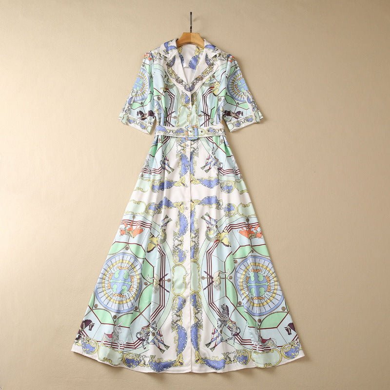 Women's sequin short-sleeve midi dress in multicolor illustrated print with tied waist belt.