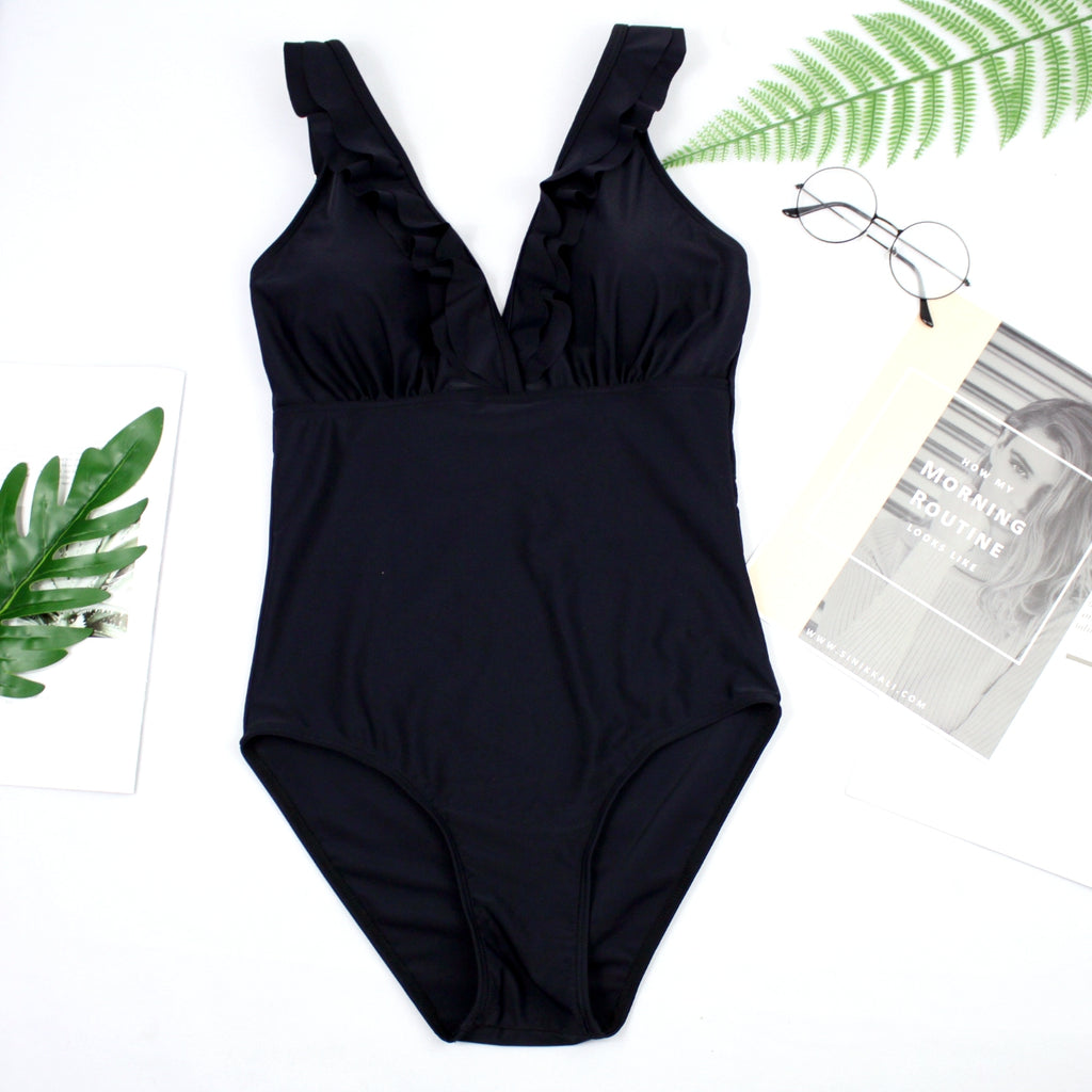 Black one-piece swimsuit with V-neck and ruched front