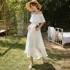 White boho off-shoulder tiered midi dress with layered skirt and ruffled bodice