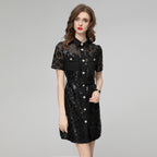 Black sequin short sleeve dress with point collar, front buttons, and chest pockets