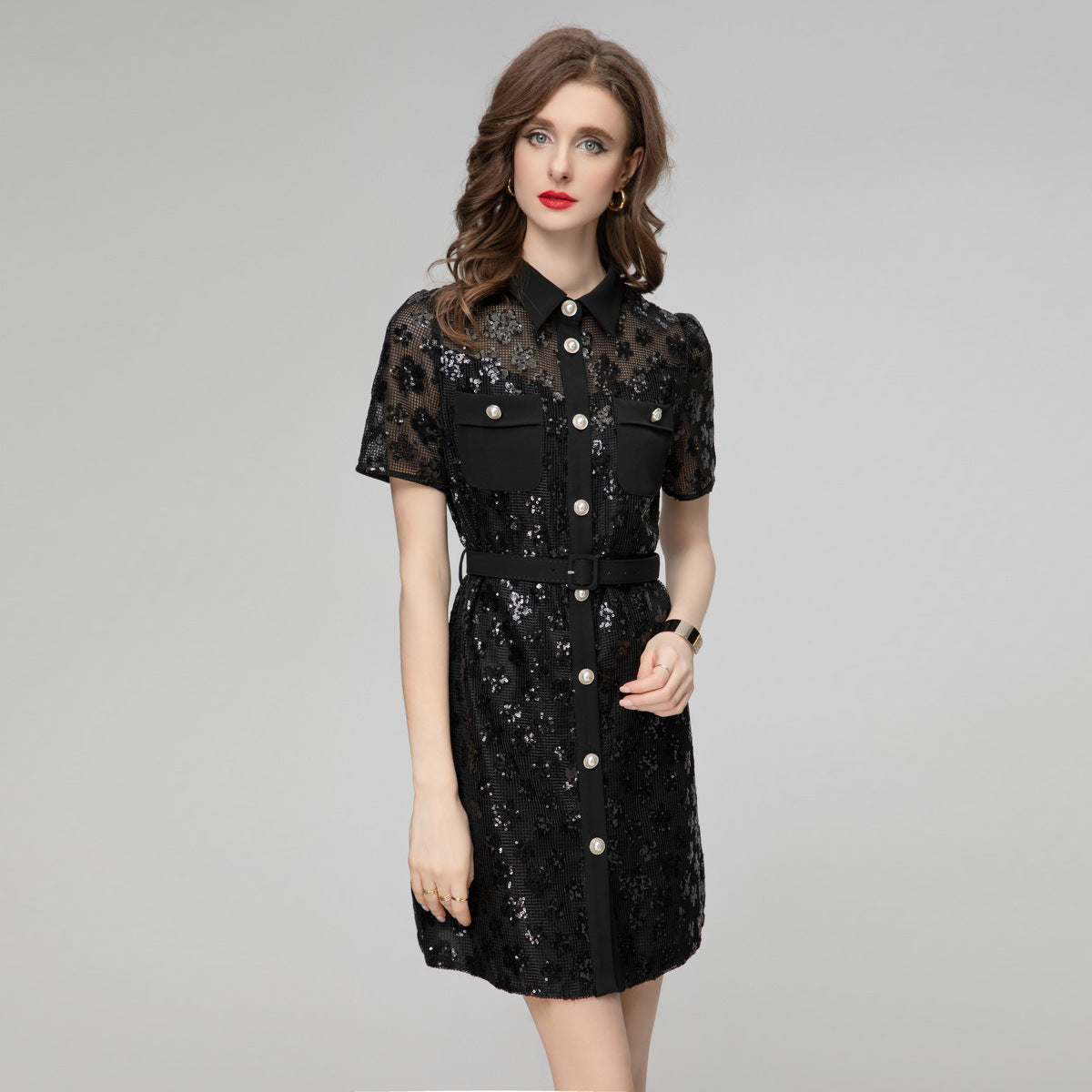 Black sequin short sleeve dress with point collar, front buttons, and chest pockets