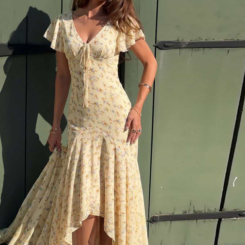 Cream maxi floral dress with pink flowers, V-neck and short ruffle sleeves, asym hem