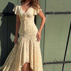 Cream maxi floral dress with pink flowers, V-neck and short ruffle sleeves, asym hem