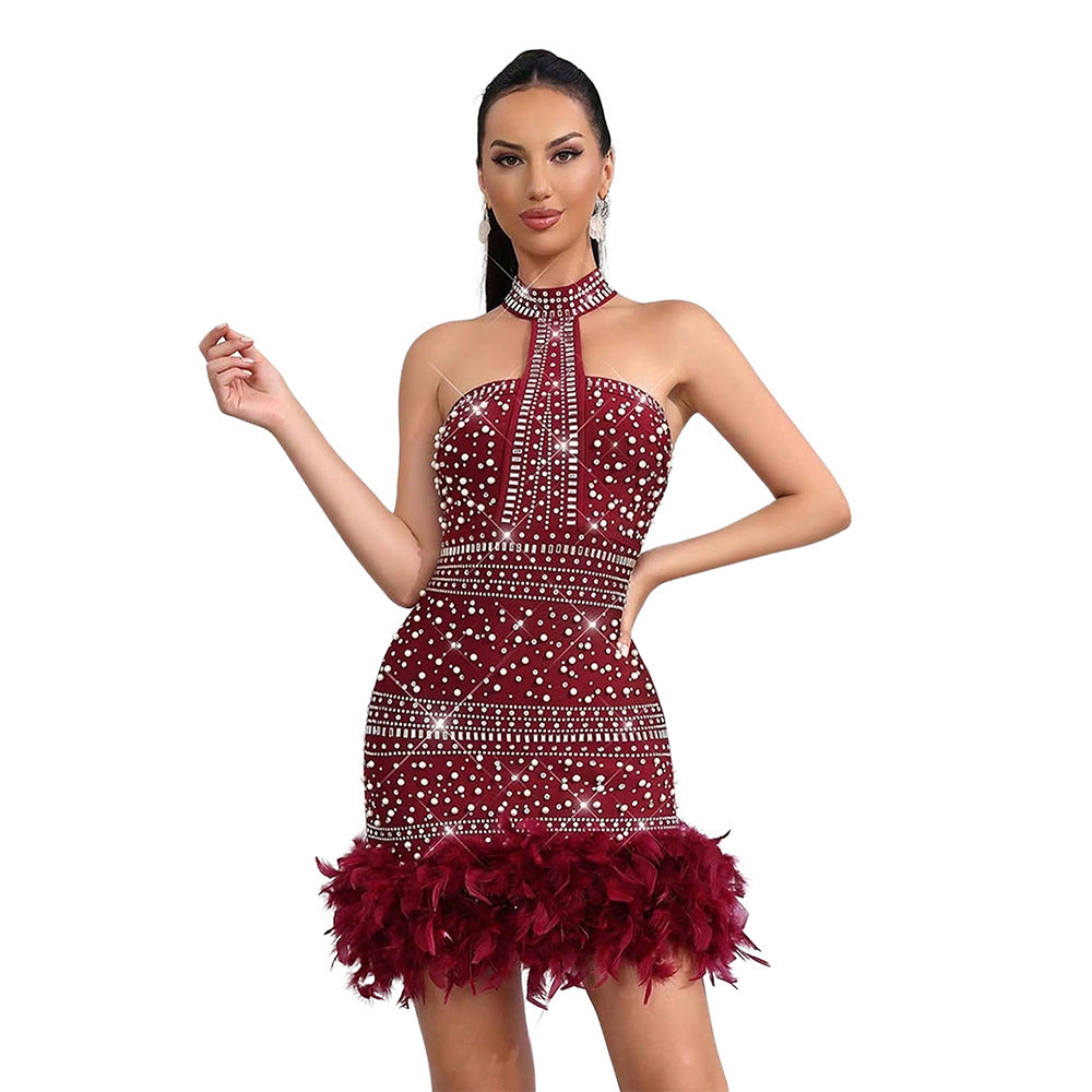Dark red halter sleeveless cocktail dress with beaded pattern and feather hem