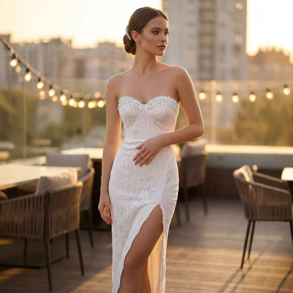 White lace maxi sleeveless dress with sweetheart neckline and side slit