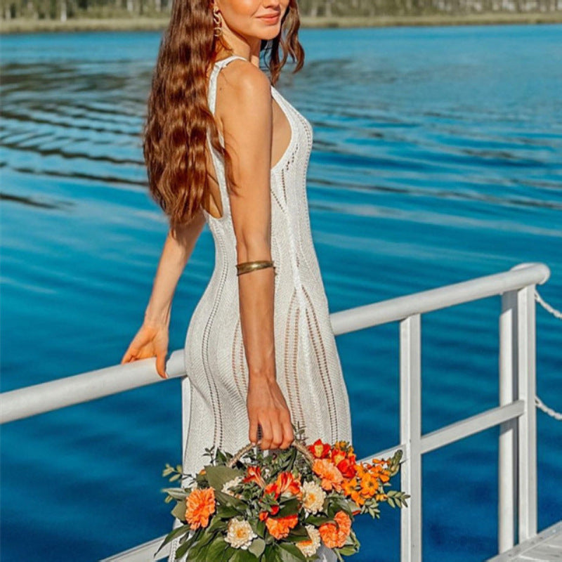 White knit maxi dress with V-neck, sleeveless design and open back