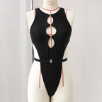 Black deep V one-piece swimsuit with vertical oval cutouts and waist belt.