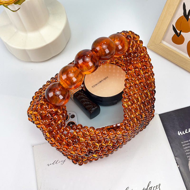 Women's Amber Beaded Dumpling Handbag