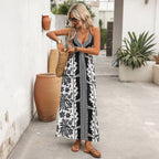 Black-and-white halter maxi dress with V-neck and patterned panel detail