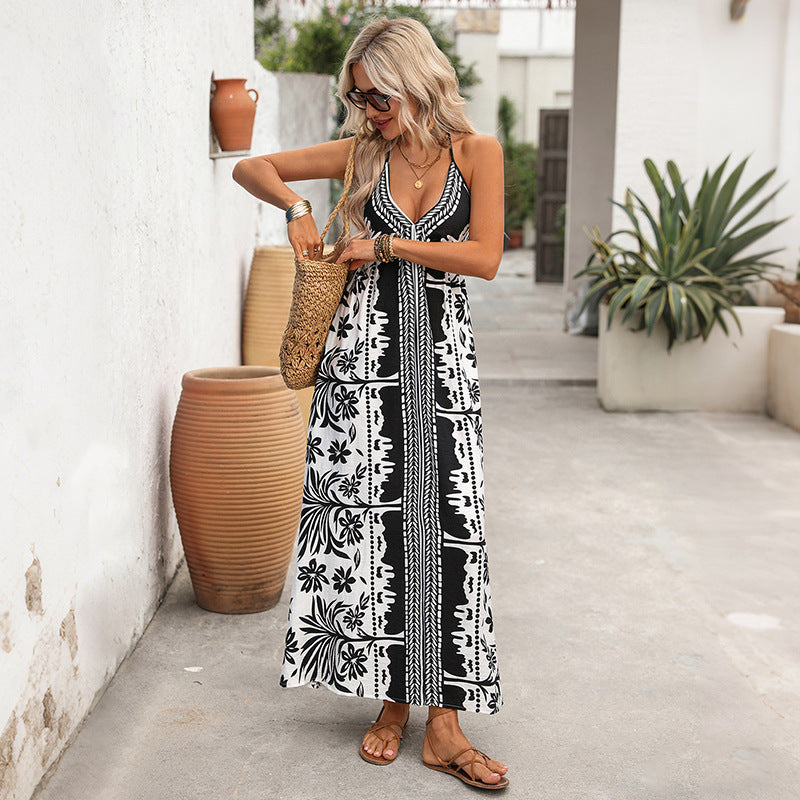 Black-and-white halter maxi dress with V-neck and patterned panel detail