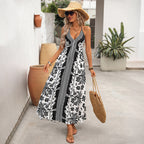 Black-and-white halter maxi dress with V-neck floral print and full skirt