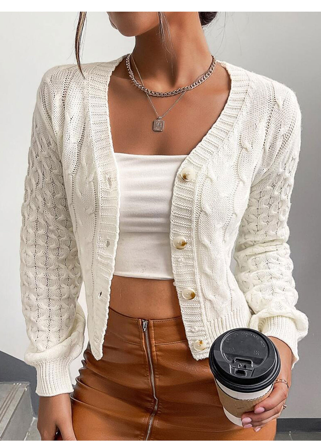 Ivory cable-knit V-neck cardigan with gold-button front, long sleeves