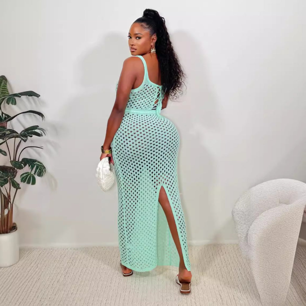 Mint-green lace maxi dress with open back and high slit, sleeveless eyelet pattern