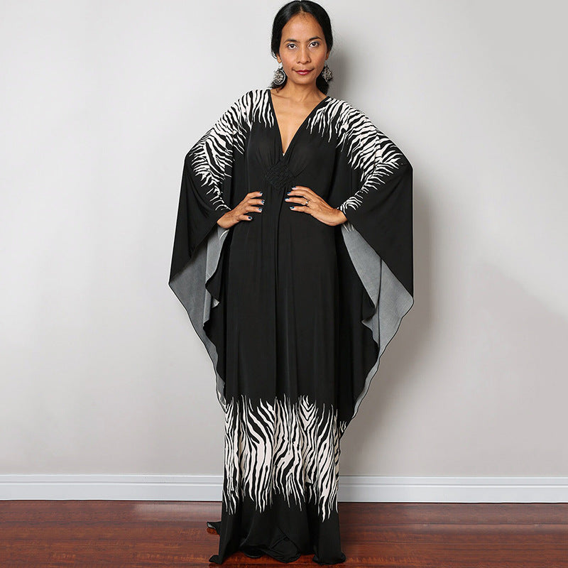 Black beach dress one-piece swimwear with zebra print hem and flowing kimono sleeves