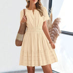 Cream short-sleeve summer dress with V-neck and gathered tiered hem