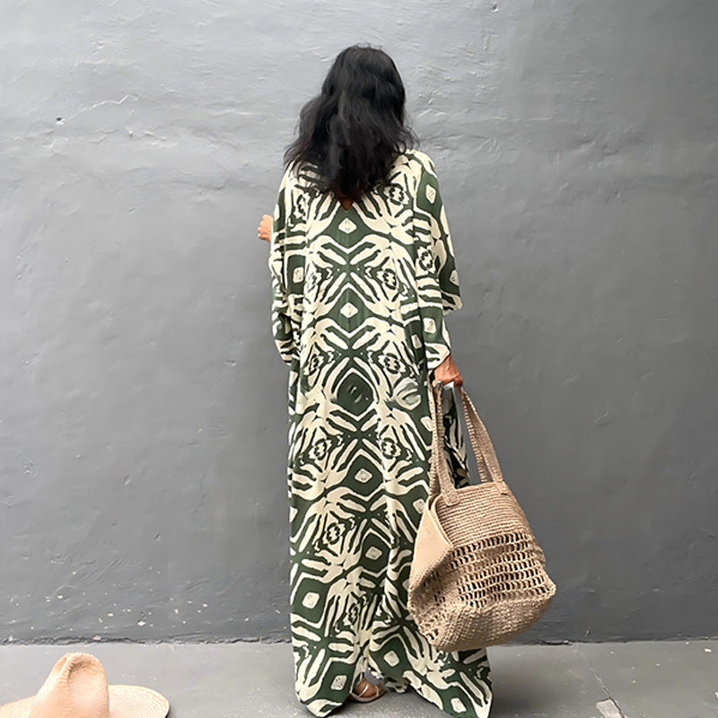 Rayon drawstring maxi dress in light green with white animal print, back view