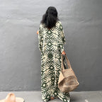 Rayon drawstring maxi dress in light green with white animal print, back view