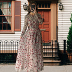 Women’s floral long-sleeve maxi dress, rounded neckline and gathered tiered skirt, multi