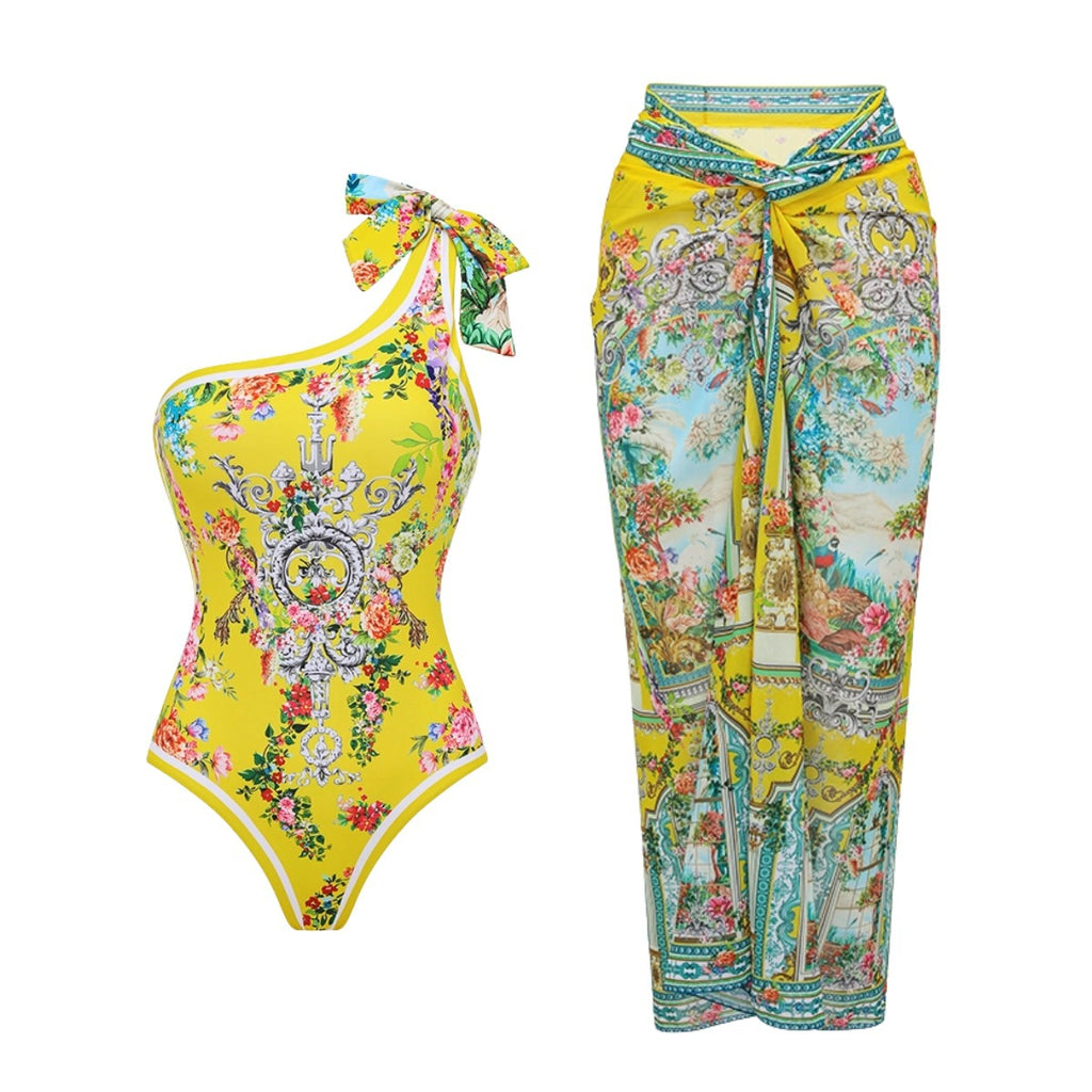 One-piece swimsuit and long swim skirt in bright yellow and teal ornate floral paisley print