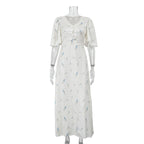 Ivory satin maxi dress with V-neck, button front and blue floral print
