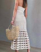 Ivory strapless crochet maxi dress with repeating circle eyelet cutouts