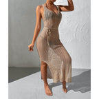 Beige knitted maxi dress with scoop neck, sleeveless design, and openwork pattern