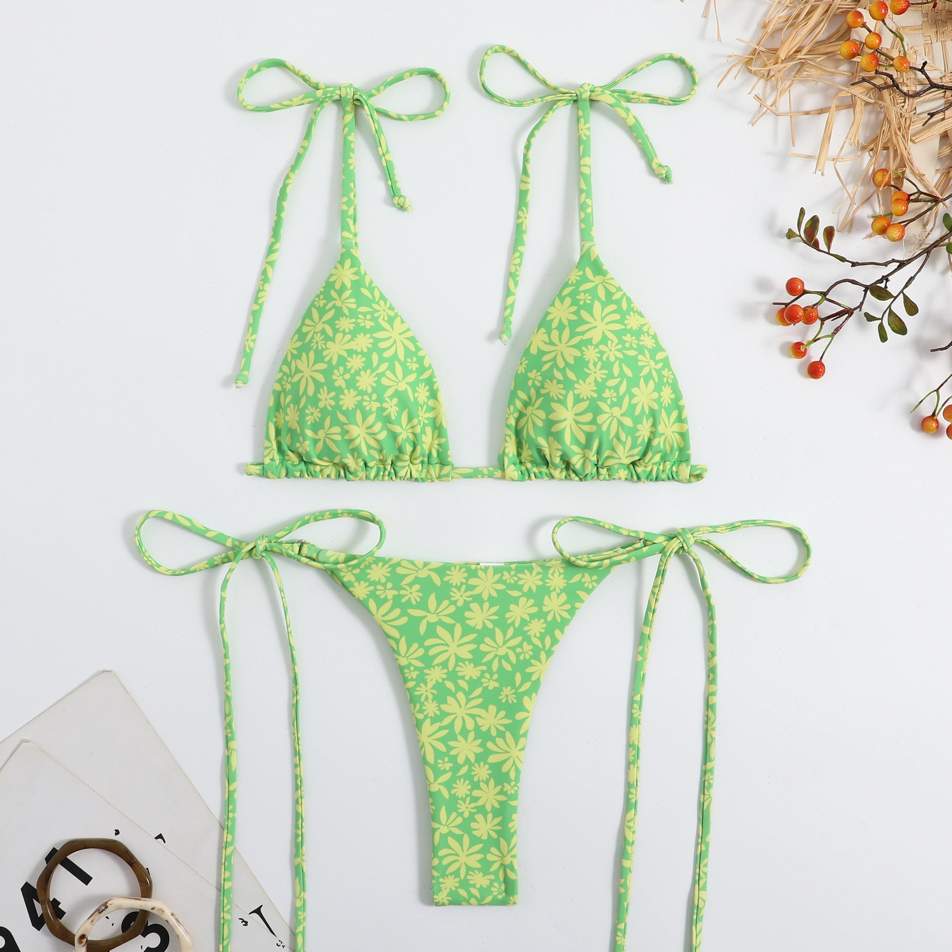 Green floral triangle bikini with string tie straps and high-cut matching bottom