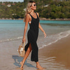 Black sleeveless chevron knit beach cover-up dress with V neckline and side slit