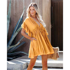 Backless cotton dress in mustard gold, short ruffled sleeves, V-neck, gathered skirt