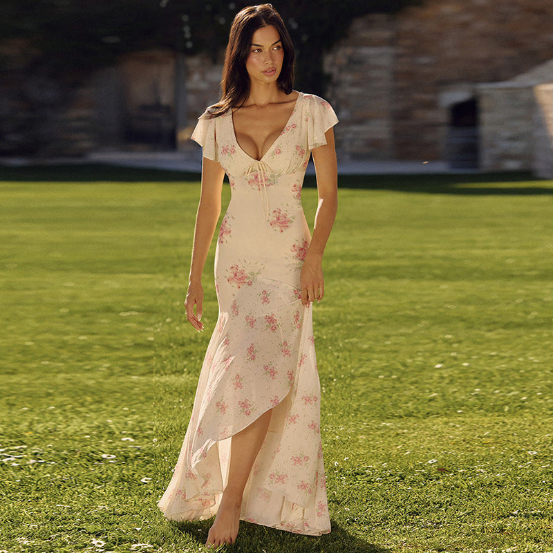 Cream maxi floral dress with pink blooms, V-neck short sleeves, layered asymmetrical skirt