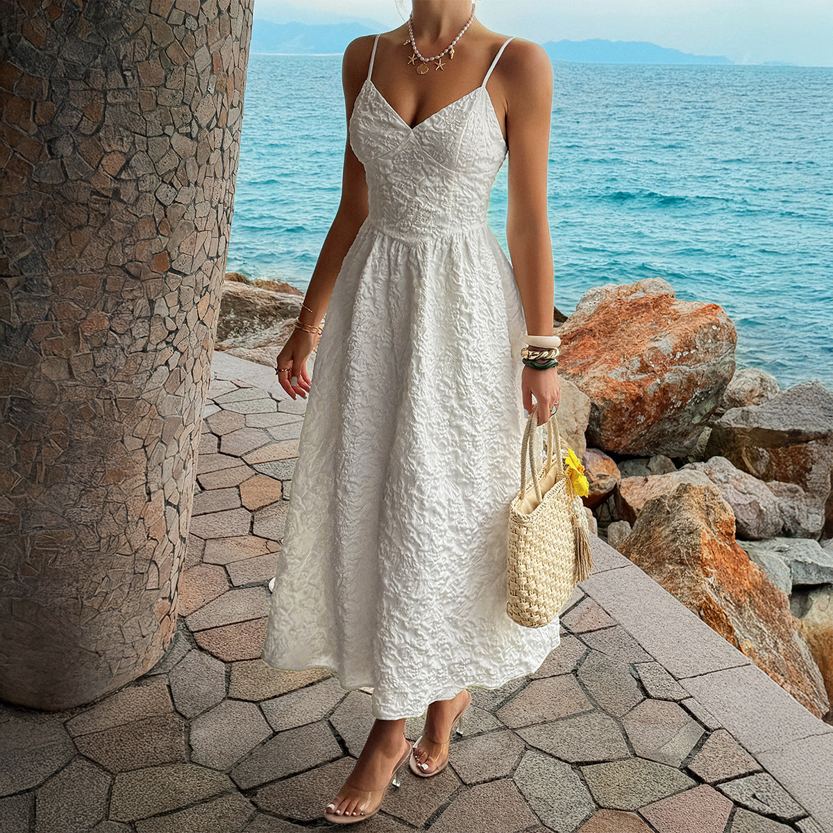 White casual summer dress with spaghetti straps and gathered skirt, full length view