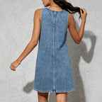 Blue denim sleeveless sling dress with central back seam and floral-embroidered hem