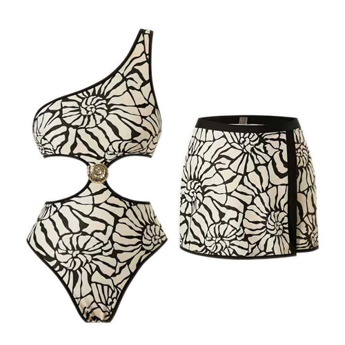 Asymmetric one-piece swimsuit view, high-cut leg with cutout, gold ring detail, skirted hem
