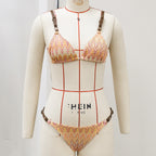 Patterned one-piece swimsuit with adjustable shoulder straps, V-neck and cheeky cut