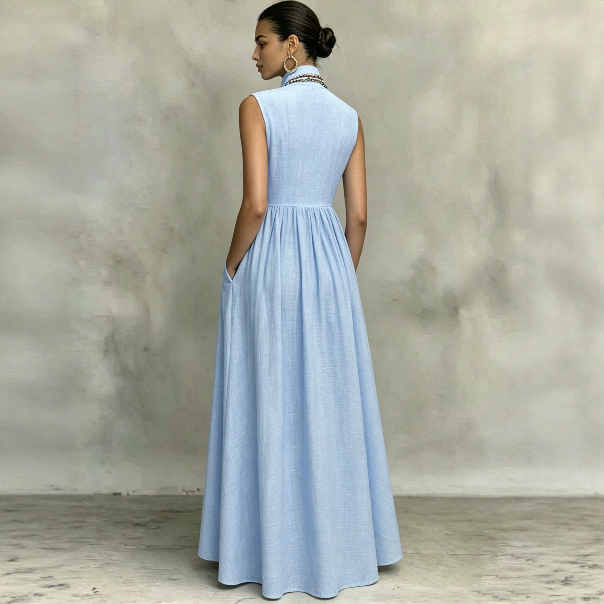 Light blue sleeveless maxi dress, scoop back, gathered waist, pleated skirt