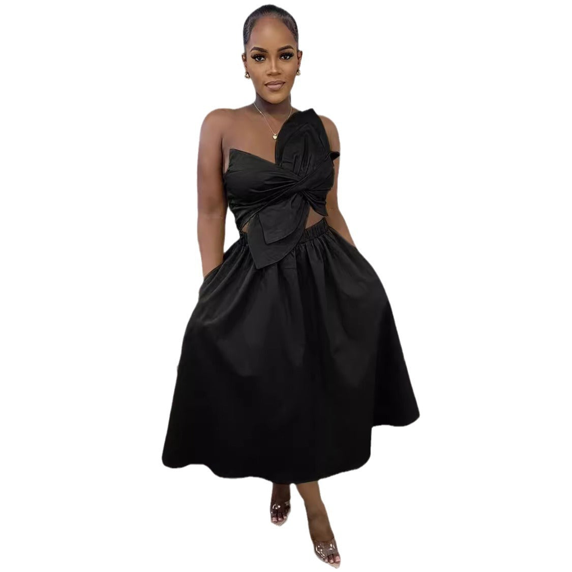 Black sleeveless midi dress with one-shoulder twist detail and voluminous skirt